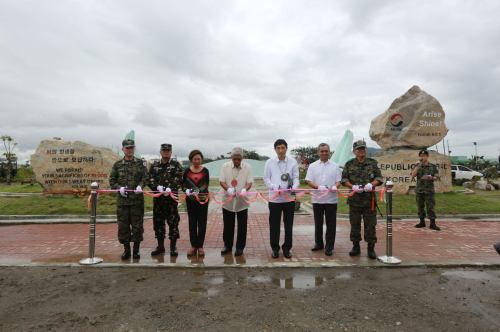 SYMBOL OF ARAW. Philippine government officials led by Defense Sec. Voltaire Gazmin graced the ribbon-cutting ceremony of the Araw Shrine in Leyte. (Photo by: Office of the Civil Military Operations (U7), Central Command, AFP)